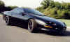 Black powder coated wheels on black Z.  (don't know wheel brand???)